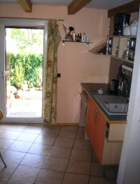 The flat (apartment) - kitchenette and exit to the garden